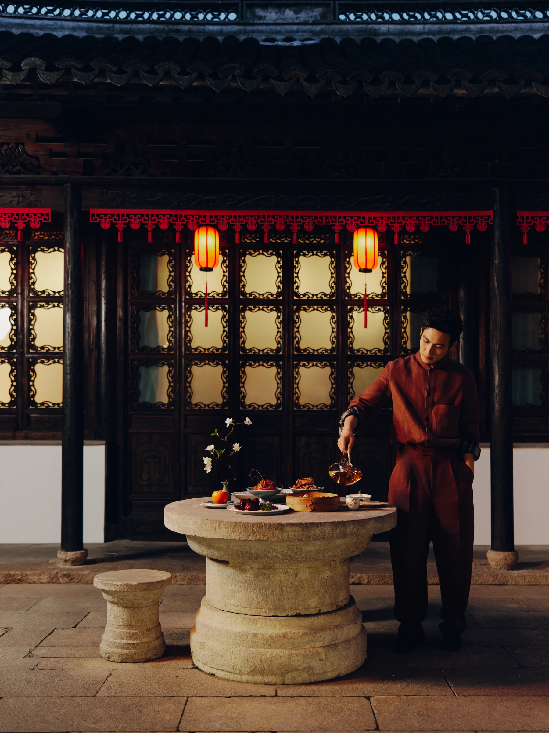 GRAZIA editorial in a lantern-lit courtyard