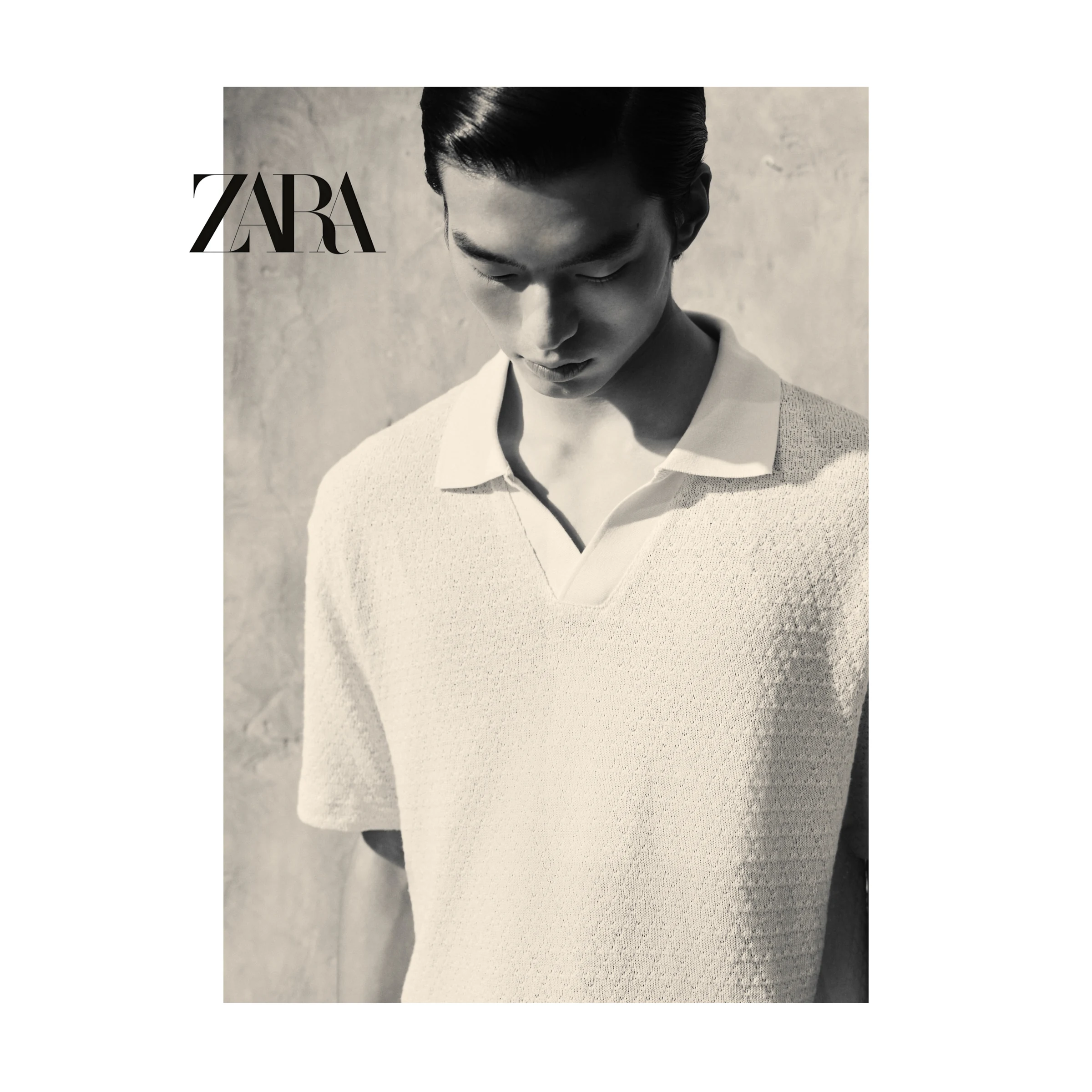 Black-and-white ZARA portrait in a white knit polo
