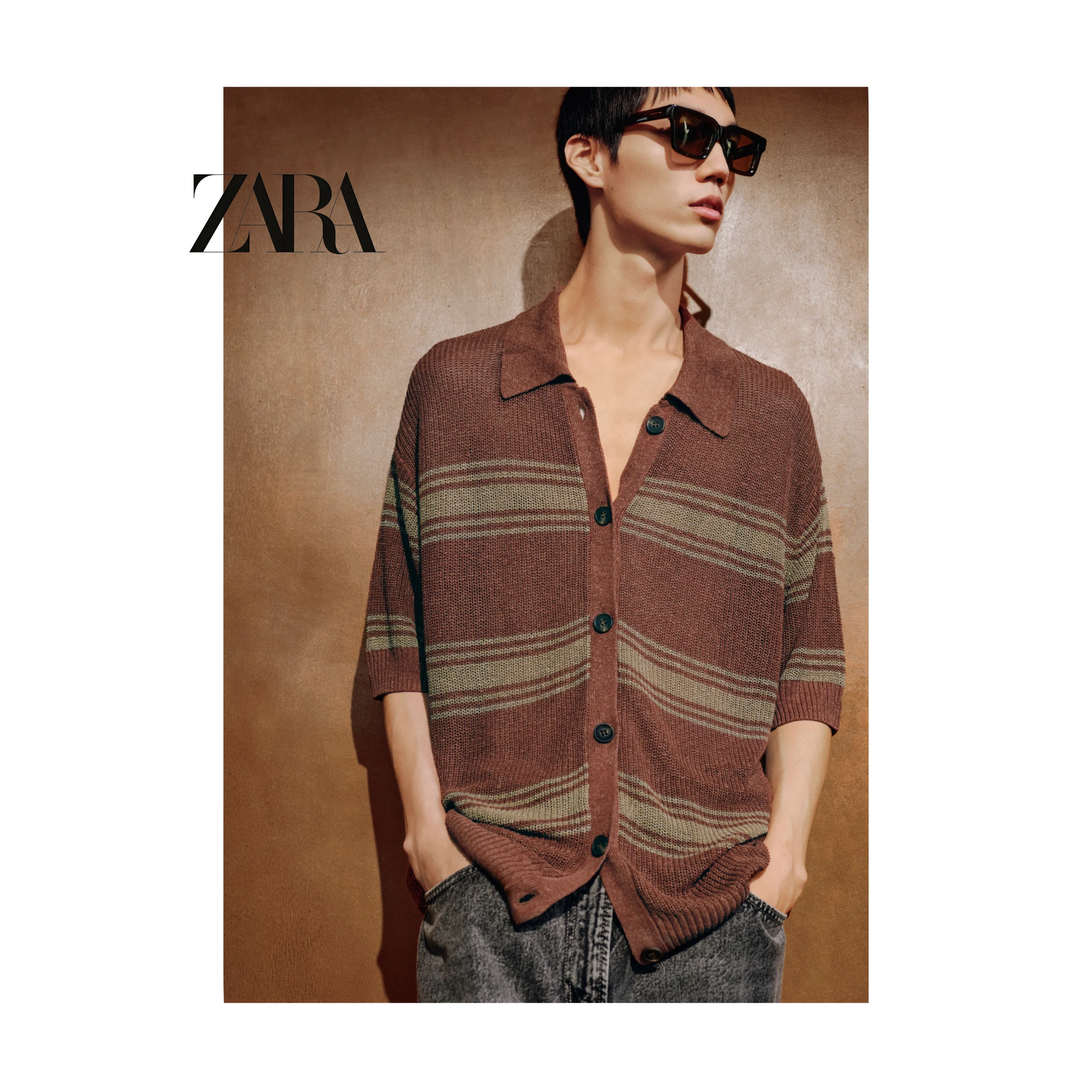 ZARA portrait in a striped brown shirt and sunglasses